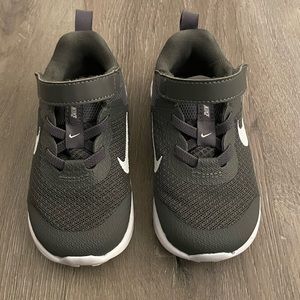 7c gray and white Nikes